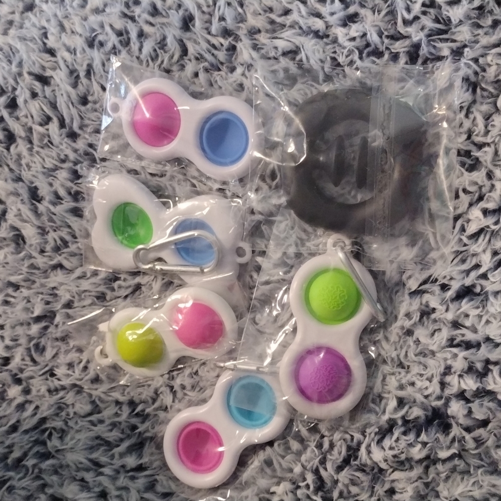 BRAND NEW Factory sealed simple dimple fidget toy